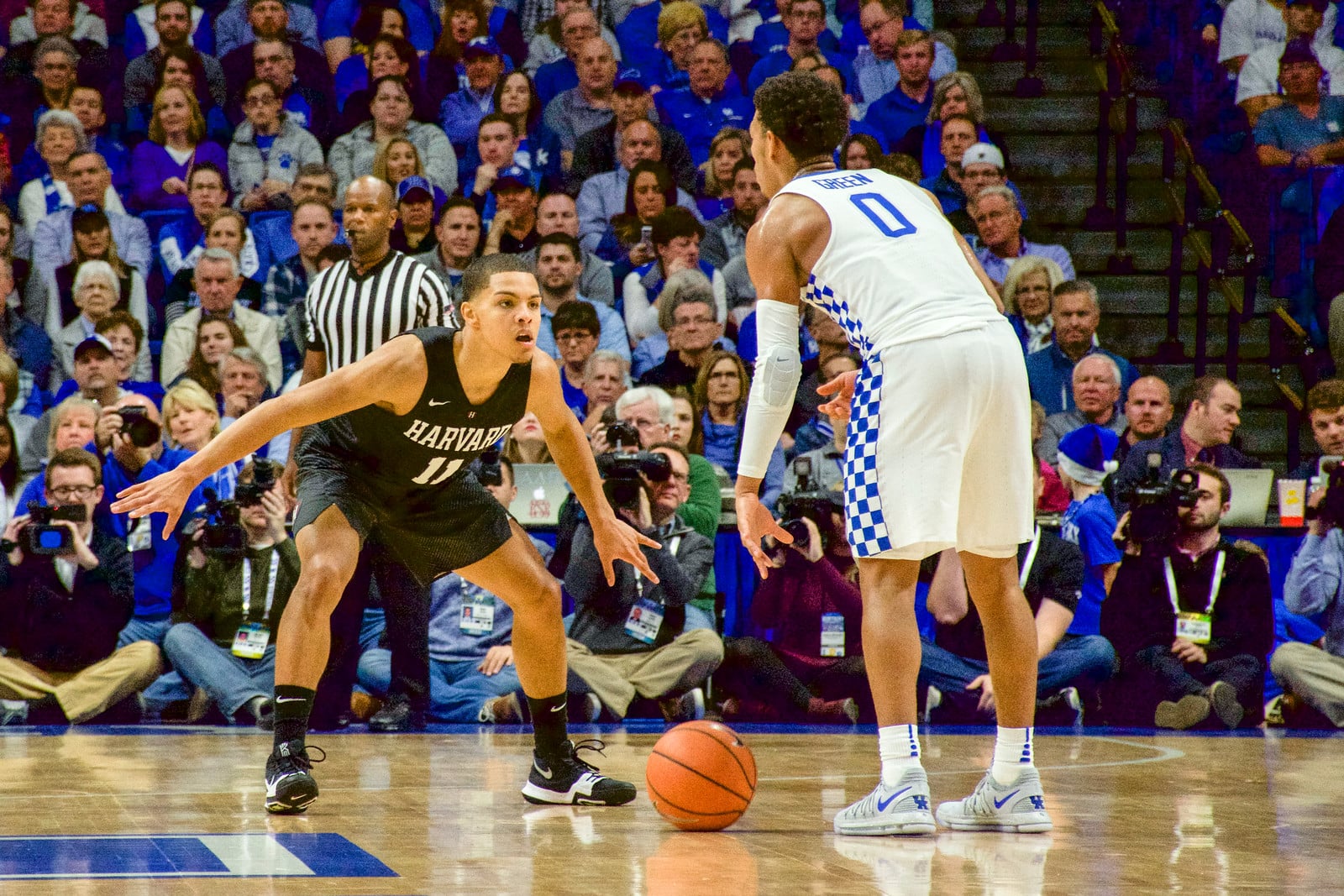 Sophomore guard Bryce Aiken squares up against Kentucky counterpart Quade Green in Saturday's contest against the No. 7 Wildcats. Aiken and the Crimson had Green on lock this weekend, as the Philadelphia native mustered just one basket in his lowest-scoring performance all season.