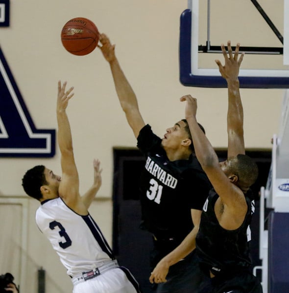 Seth Towns blocks Yale guard Alex Copeland in New Haven