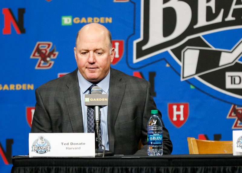 Harvard head coach Ted Donato '91 speaks at the postgame conference after the 3-2 OT semifinal loss.