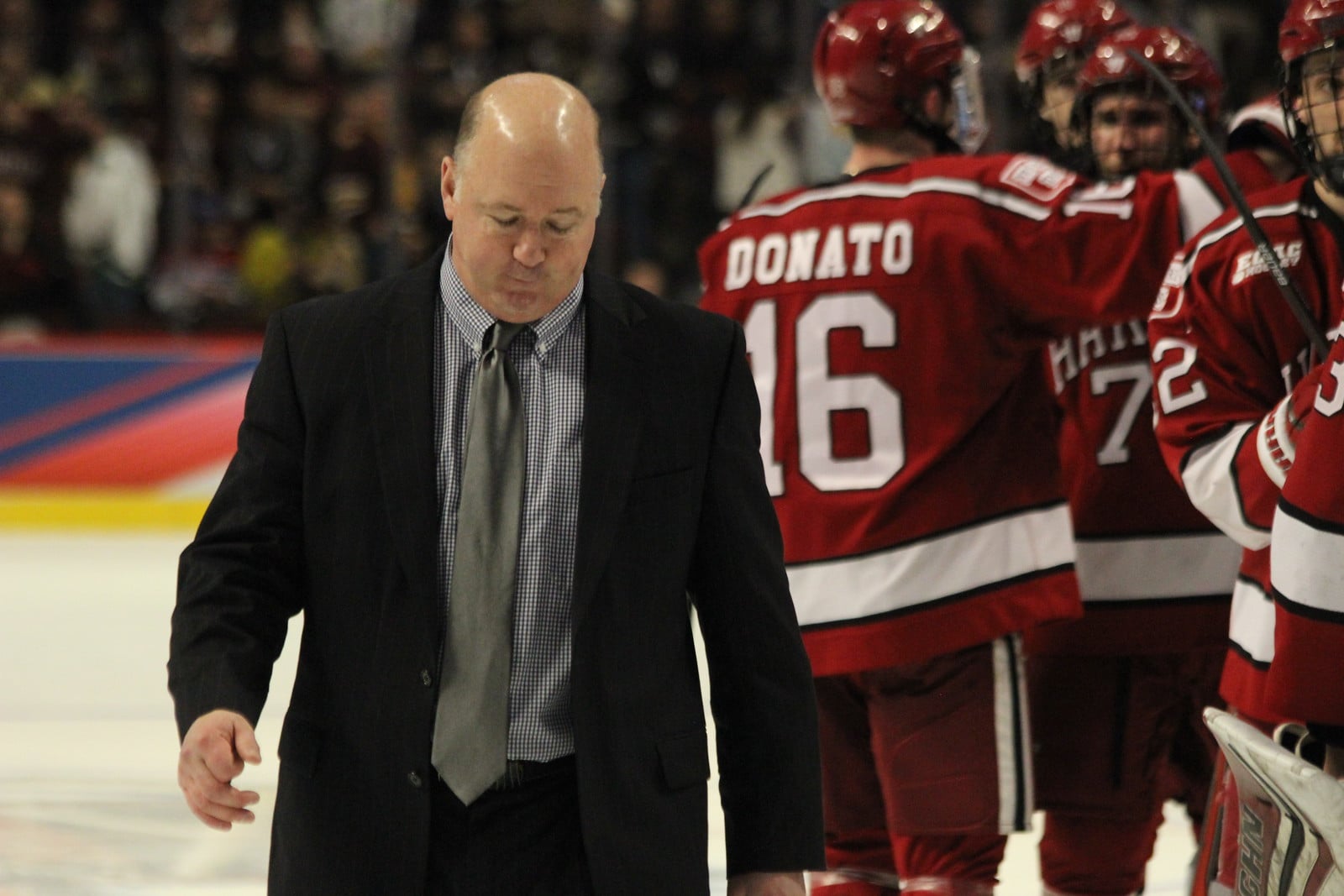 After bowing out of the NCAA Tournament in April's Frozen Four, coach Donato leaves the ice and lets his son Ryan have a moment with the outgoing seniors.