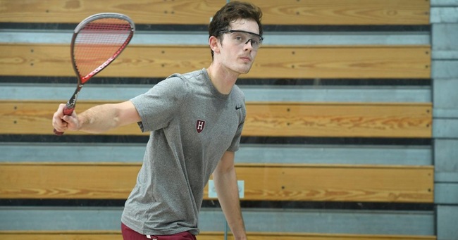 David Ryan swings away. This weekend the co-captain headlined six Harvard semifinalists as select members of the Harvard men's and women's squash teams competed at George Washington University at the individual national championships.
