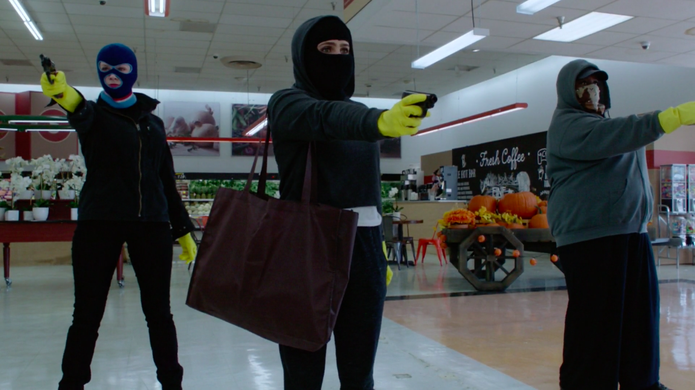 Beth Boland (Christina Hendricks), Annie Marks (Mae Whitman), and Ruby Hill (Retta) rob a grocery store in the pilot of NBC's "Good Girls."