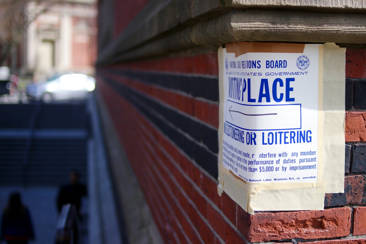 A sign directs students to voting places during Harvard's second unionization election April 18.