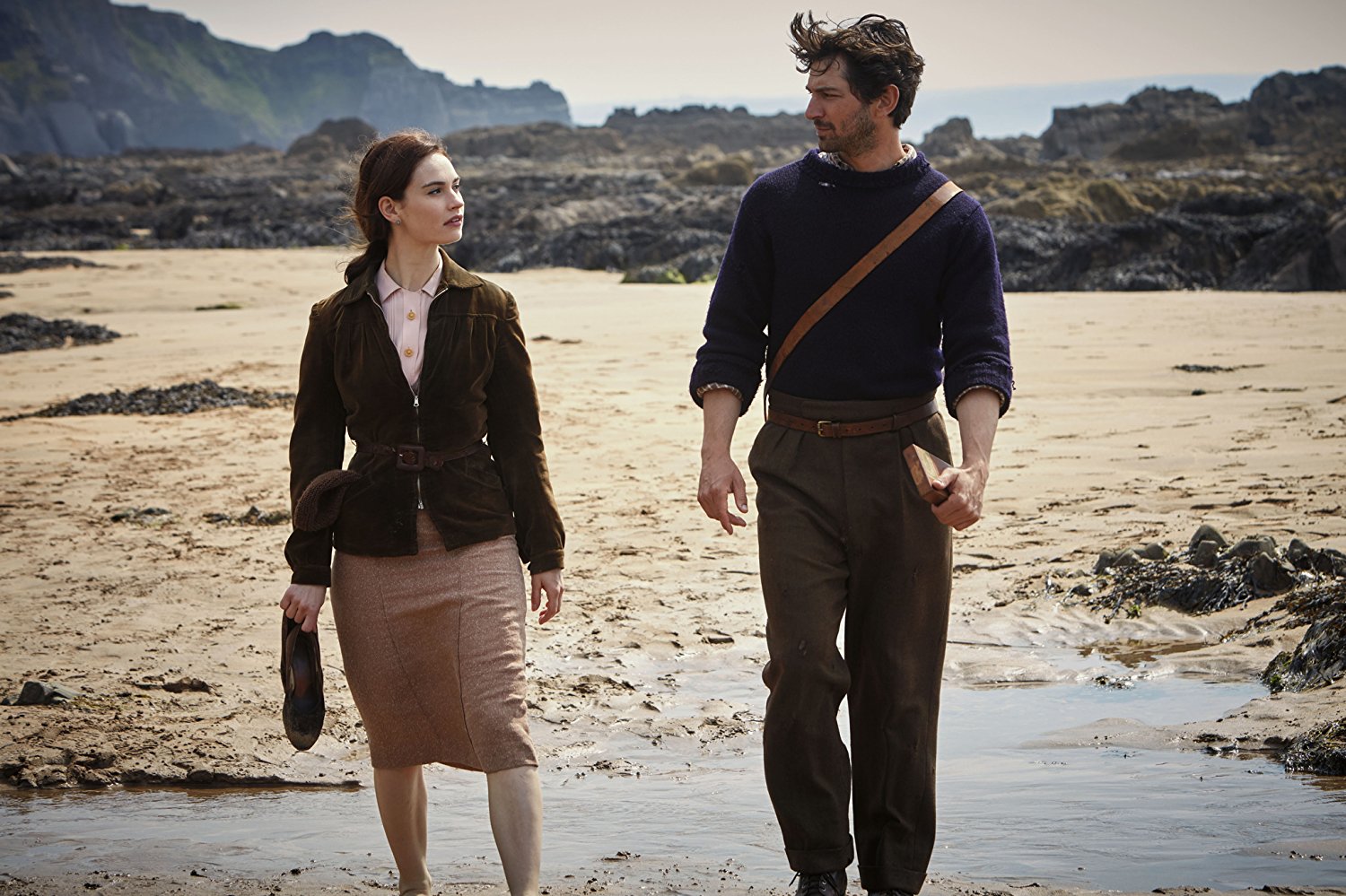 Lily James and Michiel Huisman star in "The Guernsey Literary and Potato Peel Society," directed by Mike Newell. 