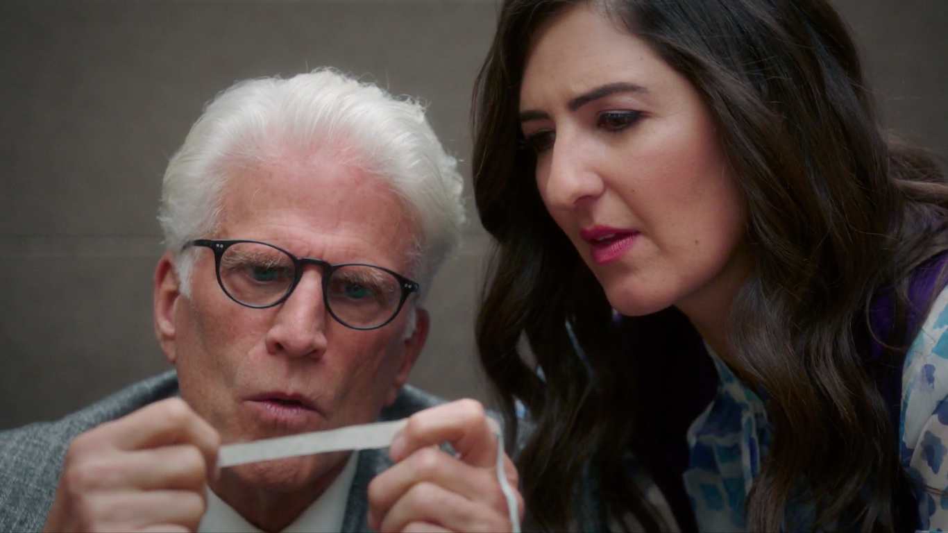 Michael (Ted Danson) and Janet (D'Arcy Carden) observe the lives of their human friends on Earth.