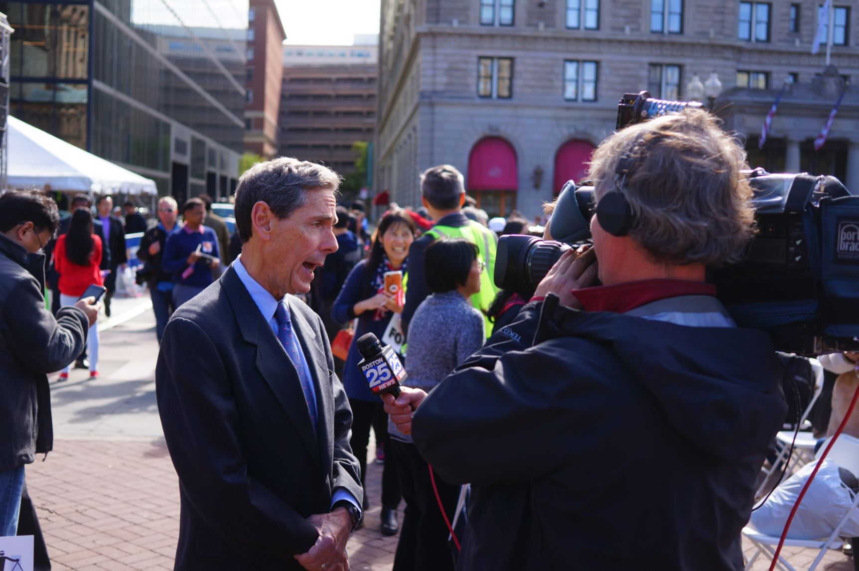 Edward Blum, the president of Student for Fair Admissions, gives an interview to a reporter during a rally held to support his group and its lawsuit alleging Harvard discriminates against Asian-American applicants.