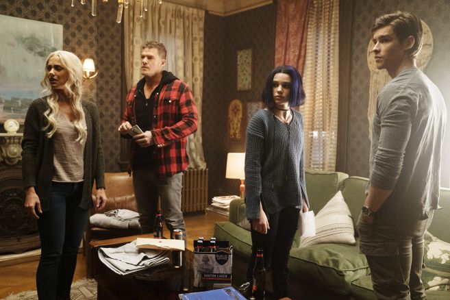 Dove (Minka Kelly), Hawk (Alan Ritchson), Raven (Teagan Croft), and Robin (Brenton Thwaites) team up in "Titans" on DC Universe.