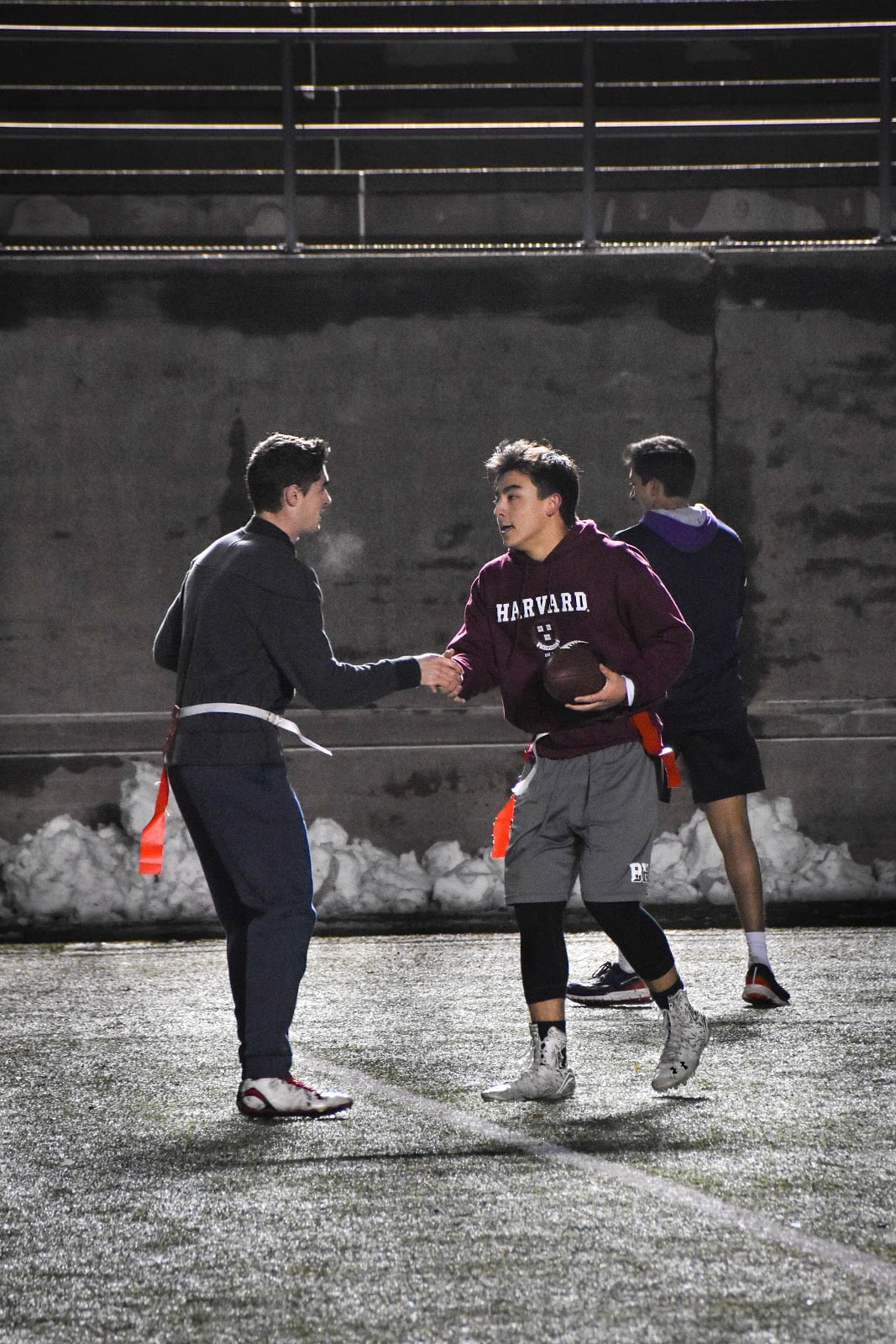 After scoring their final touchdown, teammates Jackson R. Hartje ‘20 and Raymond Hunt ‘21 shake hands as they congratulate each other on their victory against Yale, ultimately leading to a final score of 48-22.
