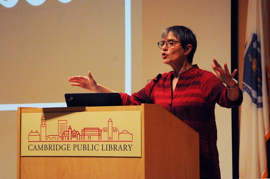 Sally Haslanger, Professor from MIT, shares her skepticism with the audience regarding the use of Saudi money and the positive impact that MIT claims it can have on the community. She stresses her dissatisfaction with what she perceives as the "plutocracy" that has developed at MIT and Harvard.
