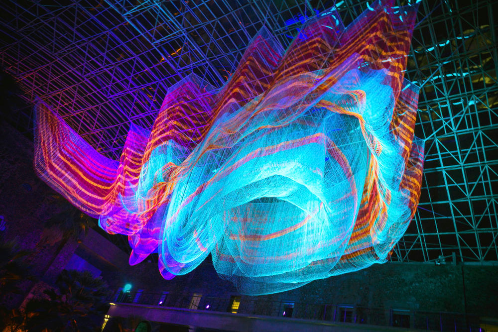 Janet S. Echelman '87's large scale artwork is inspired by fishing nets and colorful lighting.