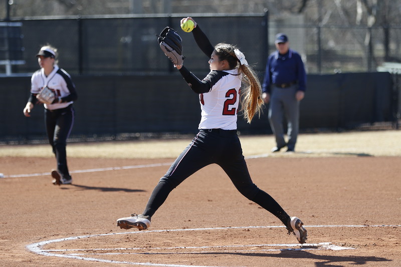 Junior pitcher Alissa Hiener winds up to launch a swift pitch at her opponent.