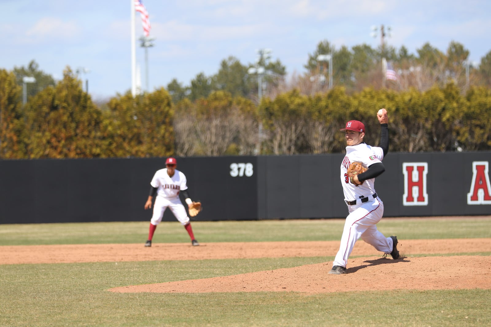 Junior Hunter Bigge has excelled as a two-way player for the Crimson this season. The righty has compiled a 5-1 record on the mound, and a .291 average at the plate