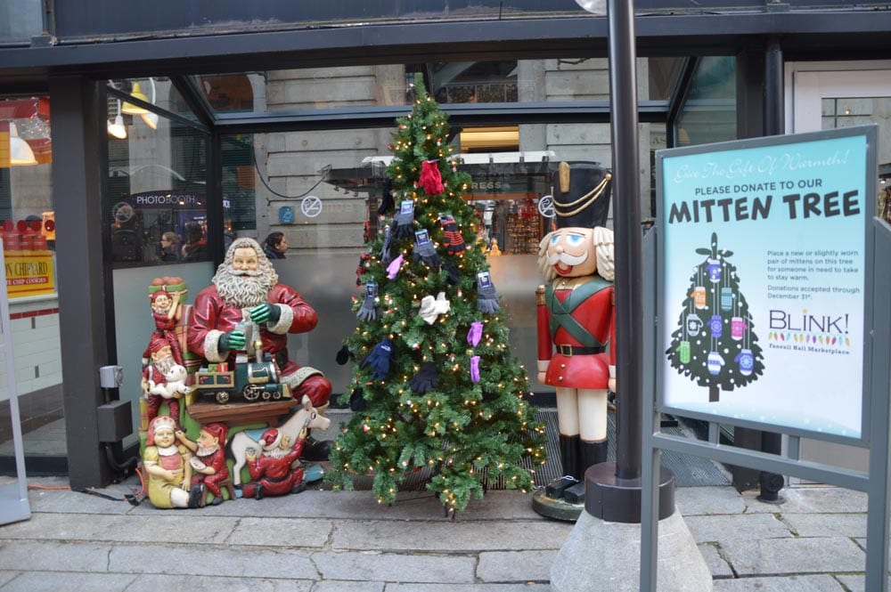 Faneuil Hall's Holiday Mitten Tree offers one way to give back this holiday season.