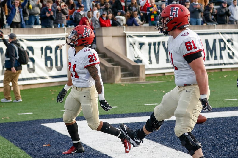 Liam Shanahan celebrates after lead-blocking first-year Aidan Borguet's way into the endzone in his final game in a Harvard uniform. Shanahan will play for the defending-champion LSU Tigers as a graduate transfer in 2020.