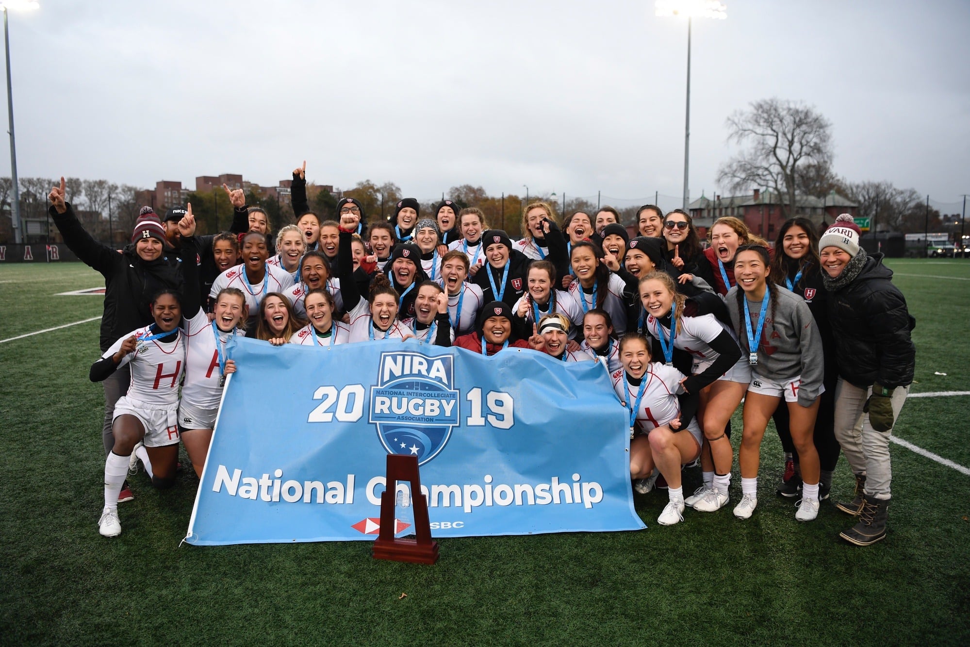The national champions pose with their medals, trophy, and banner. The Crimson would lose just twice over the course of the season...before later avenging both losses (to Dartmouth and Army West Point) in the playoffs.