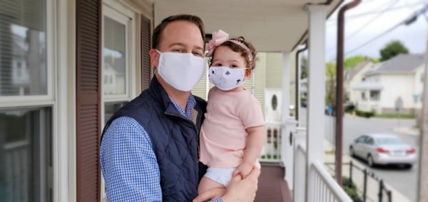 Lambert's husband Matt and young daughter Aliana pose in their Esmeralda masks.