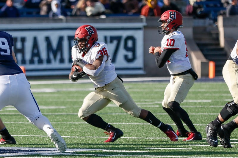 Senior running back Devin Darrington carries the ball against Yale in what may prove to be his final game in a Harvard uniform.