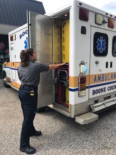 Miller inspects her ambulance in anticipation of a call.