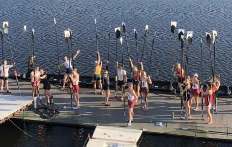 Noble and teammates at Weld Boathouse.