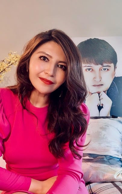 Rayhan Asat with a photo of her brother, Ekpar.