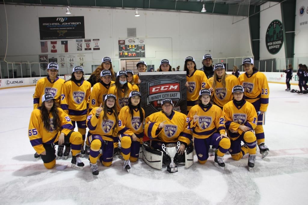 Dom Petrie (back left), junior forward on the Harvard women's hockey team and LA Lions coach, poses with the Lions after a 4-1 tournament final victory. The win would cap an undefeated run through the 2020 CCM Dallas Tournament.