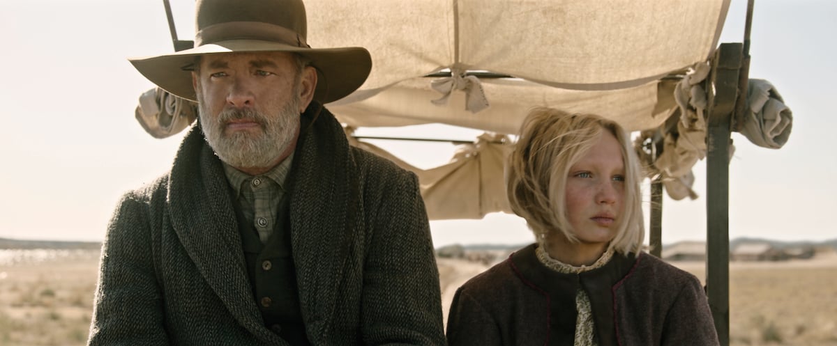 Tom Hanks (left) stars as Captain Jefferson Kyle Kidd and Helena Zengel (right) stars as Johanna Leonberger in "News of the World" (2020), directed by Paul Greengrass.
