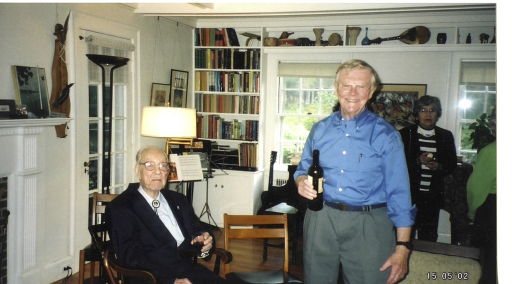 Liller, right, with Harvard Astronomy professor Fred L. Whipple at Liller's birthday symposium in 2002.