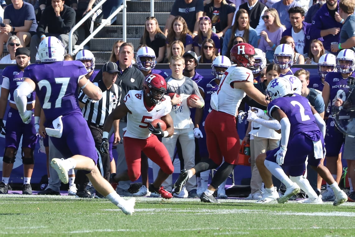 Senior wide receiver B.J. Watson navigates the sideline during Saturday's contest with Holy Cross.