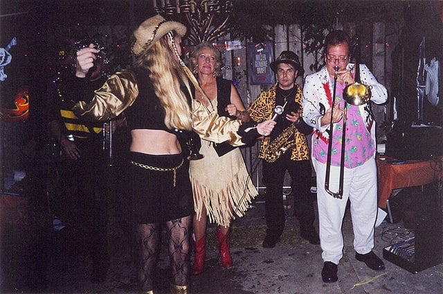 "Mustang Sally's Happy Halloween Band" plays for a party.