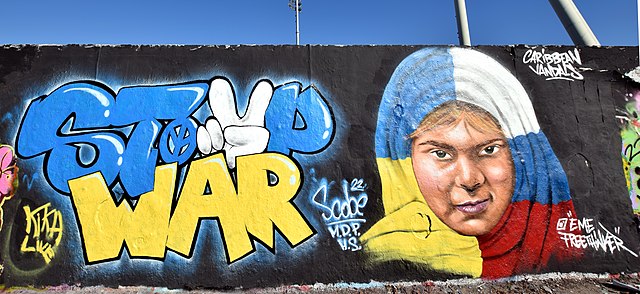 "Stop War" Graffiti by Eme FreeThinker on Russia's war in Ukraine in the Mauerpark in Berlin, Germany.