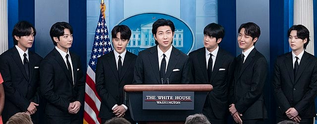 Members of BTS pictured at a May 2022 White House briefing.