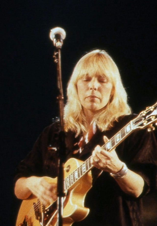 Joni Mitchell performing on stage in 1983.