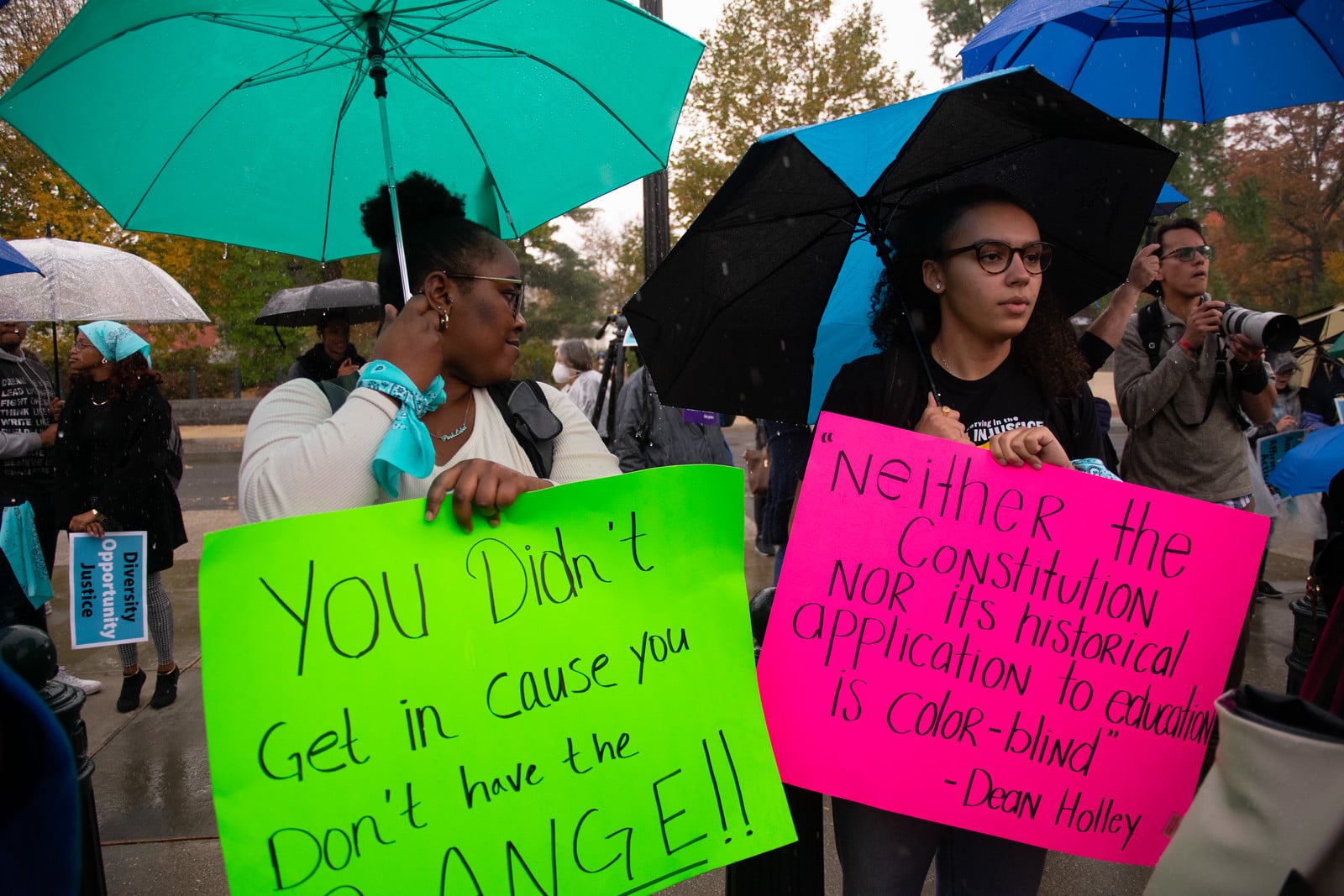 Pro-affirmative action demonstrators braved the rain outside the Supreme Court on Monday.