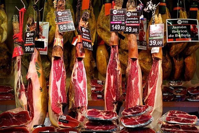 Dry-cured Spanish hams at a market in Barcelona.