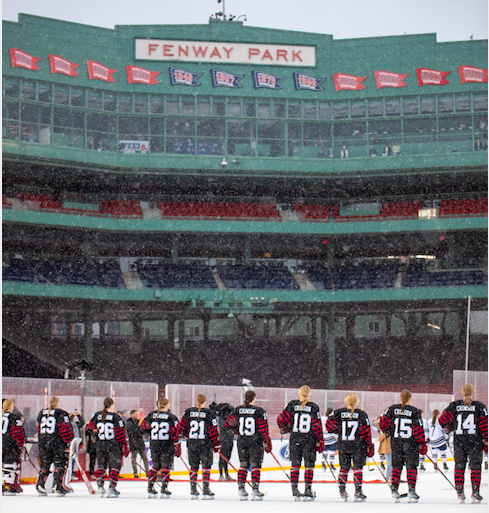 The Harvard women's ice hockey team lines up at its 2023 Frozen Fenway contest against Quinnipiac in early January. The Crimson was one of many Boston-area teams who competed in the historic park that hosted the NHL's Winter Classic.