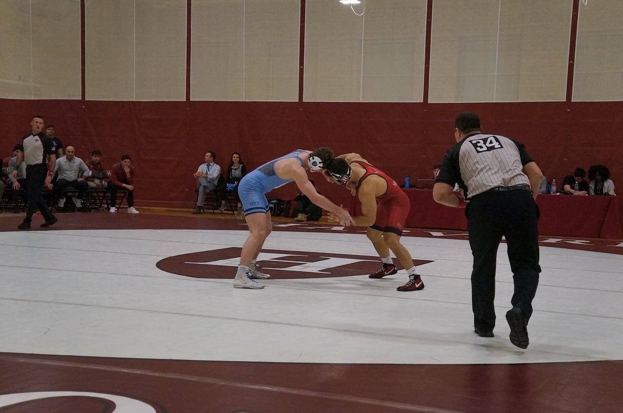 Junior 184-pounder Leo Tarantino takes down Columbia's Aaron Ayzerov in Harvard's decisive 19-18 win over the Lions last week. Tarantino had a huge take-down that scored three points important to the Crimson's victory.