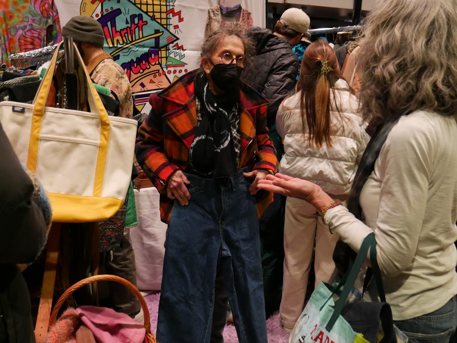 Customer trying on pants at Brighton Bazaar's Retromania.