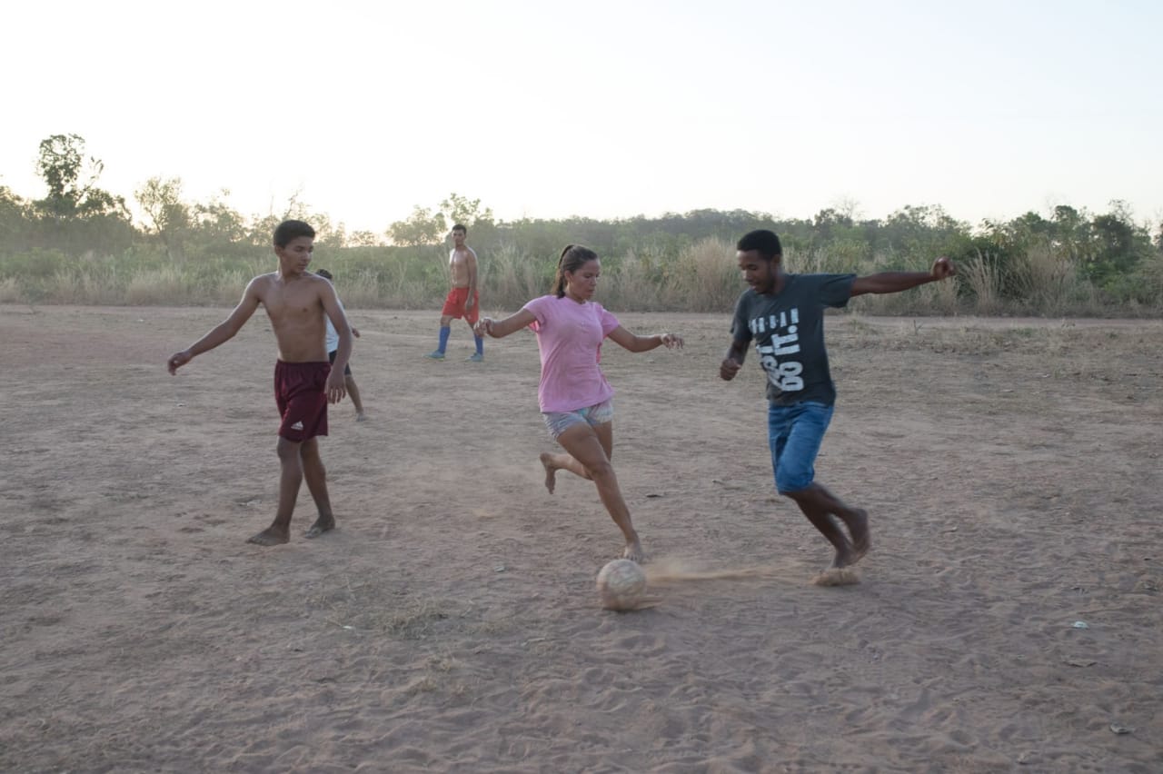 Members of the Barra da Lagoa community play soccer.