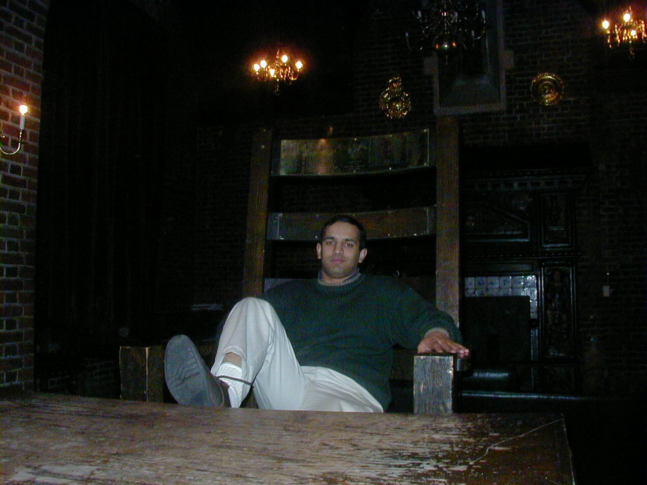 Delawala poses for a photo in the Lampoon Castle. (“You will notice that Imti is not wearing jeans and appears to be the same 35-year old as he looks today,” Graff wrote in an email.)