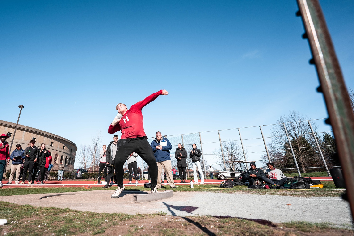At the historic HY/OC meet on Apr. 8, senior Alexander Kolesnikoff throws shot put. Kolesnikoff set a school record, throwing at 20.69 m.