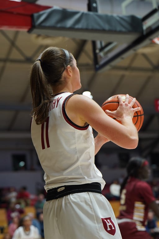 Senior guard and captain Maggie McCarthy prepare for a shot at the net in Harvard women's basketball 2022 matchup against Boston College. The Medfield native most recently recorded a career-high of three-pointers in the Crimson's 86-59 victory against Cornell.
