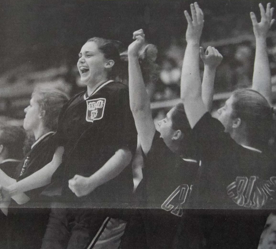 Players celebrate No. 16 Harvard's upset victory over the No. 1 Stanford Cardinal.