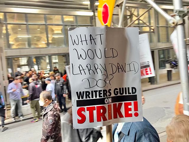 Picket line formed by writers on strike outside the location of Marvel Studio's Disney+ TV show "Daredevil: Born Again" in New York City.