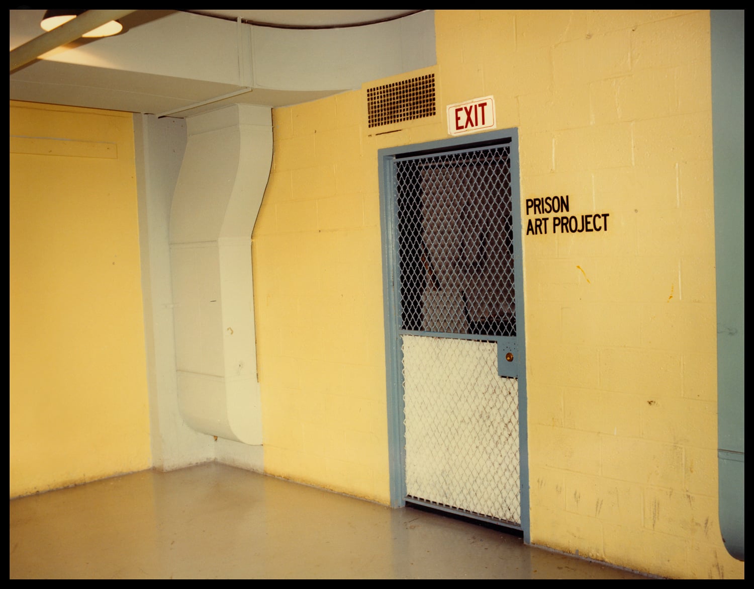 The Prison Art Project room at Walpole Prison in the 1980s. Art made by incarcerated men was exhibited in the Phillips Brooks House in 1966.