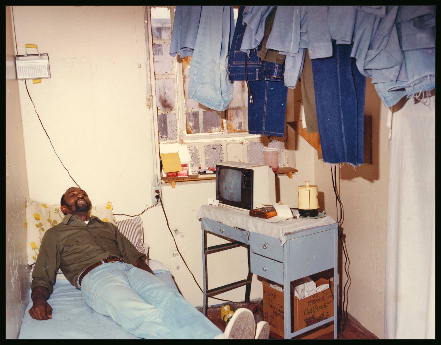 A man incarcerated at Walpole watches The Beverly Hillbillies on a TV set in his cell.