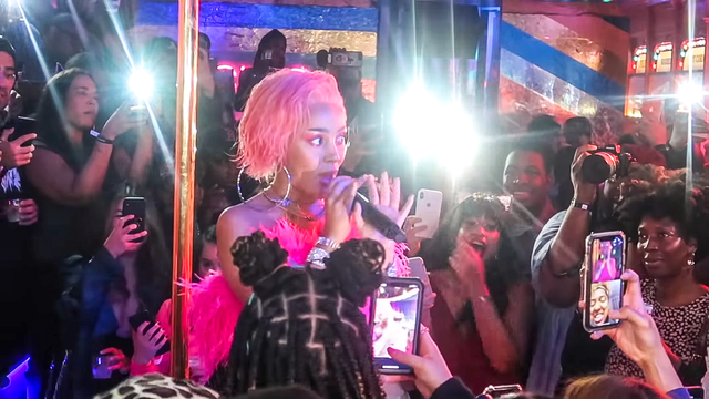 Doja Cat performs for fans at the release of her album, 'Hot Pink.'