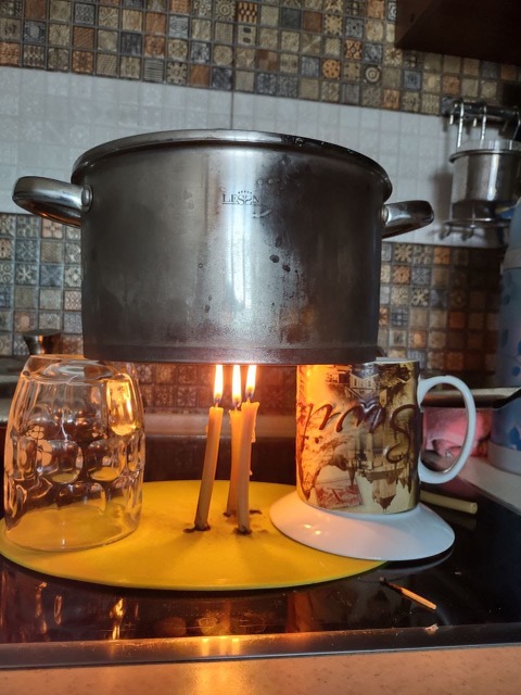 Dovgodko and her husband heat their food with candles due to Russian officials cutting off power and energy sources in Ukraine.