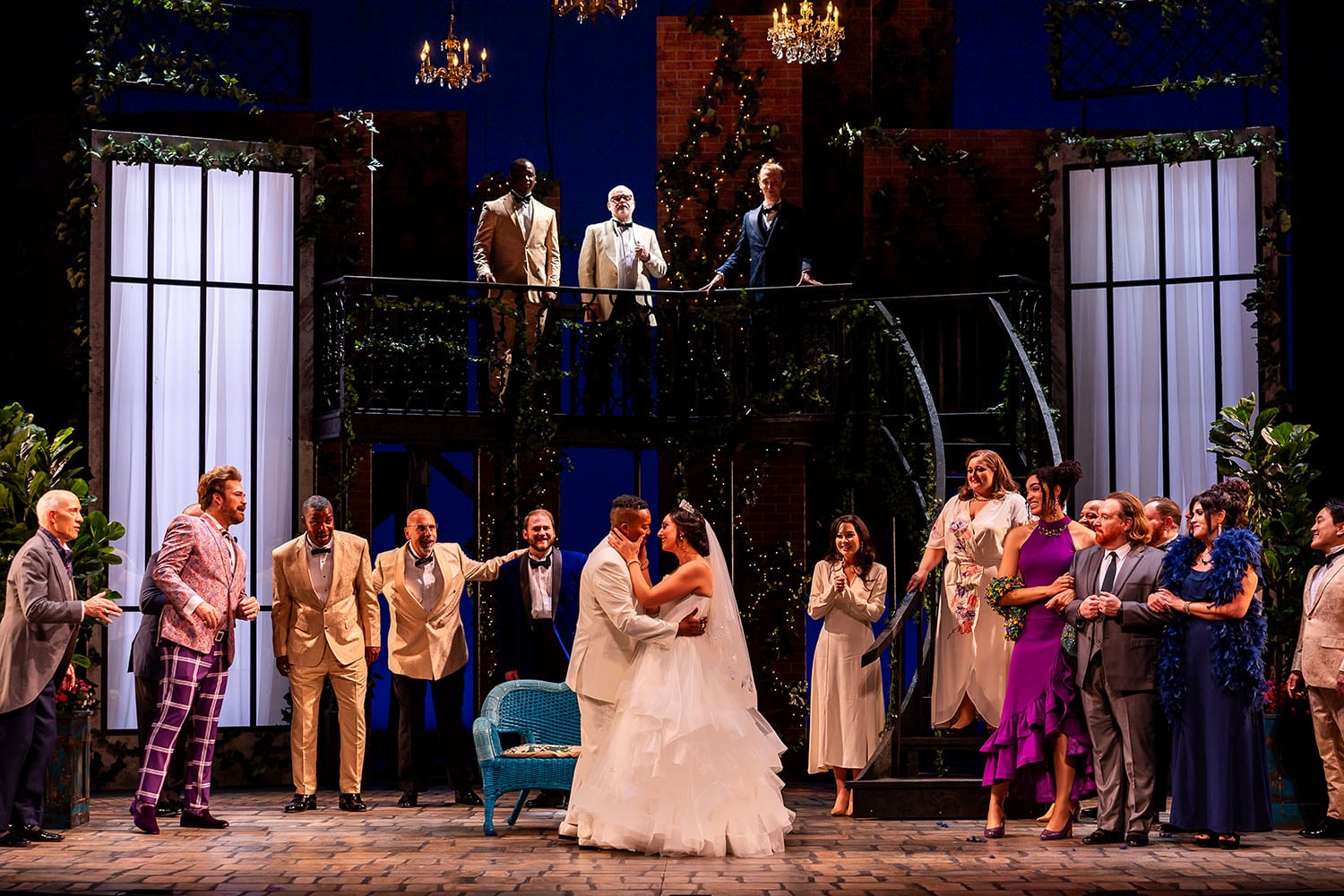 Angelina (Cecelia Hall) and The Prince Don Ramiro (Levy Sekgapane) share a kiss after their wedding in Boston Lyric Opera's production of "La Cenerentola" (Cinderella).