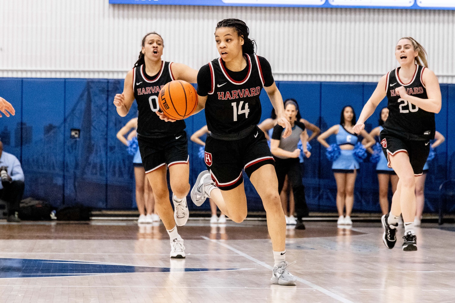 Then-sophomore guard Harmoni Turner dribbles the ball in the Great Eight game against Columbia on March 26, at which Harvard fell to Lions 77-71. Turner was a critical player for the Crimson last season, leading Harvard in scoring.