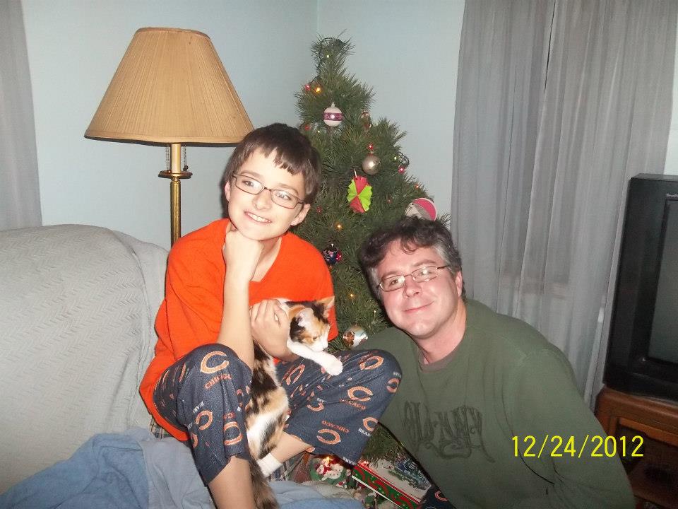 Brandon L. Kingdollar with his father in 2012.